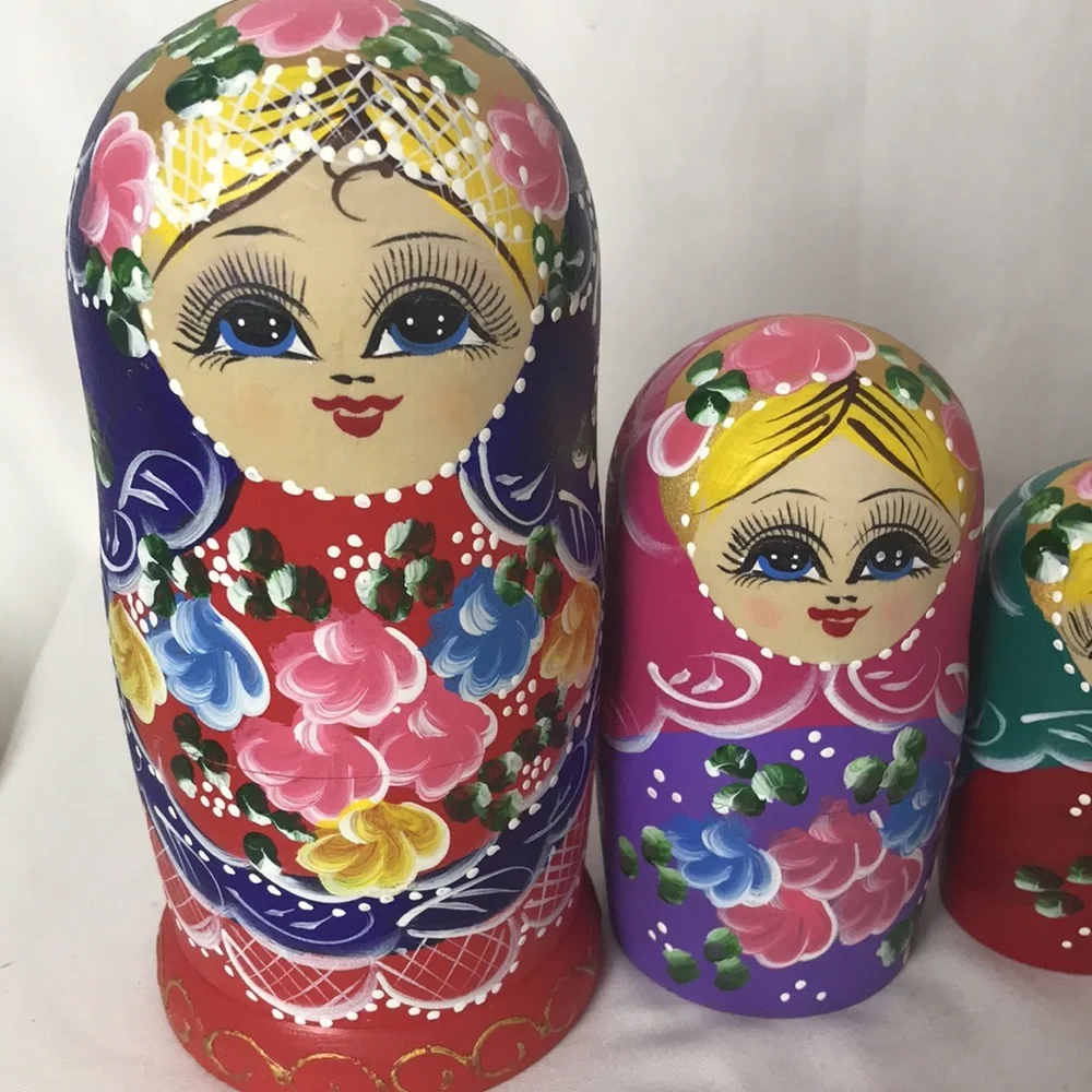 Beautifully decorated nesting dolls set